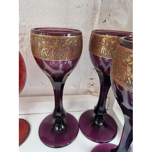 1199 - A mixed group of ceramics and glass, to include a set of four Moser amethyst goblets; three Moorcrof... 