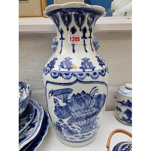 1205 - A collection of Japanese blue and white ceramics, largest 36cm high. (9)