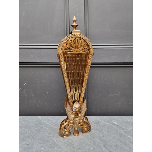 1220 - A vintage brass folding fireguard, 62.5cm high.