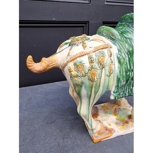 1227 - A large Chinese Tang style pottery horse, 54cm high.