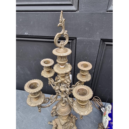 1240 - A brass four branched candelabrum; together with a pottery and brass table lamp. (2)... 