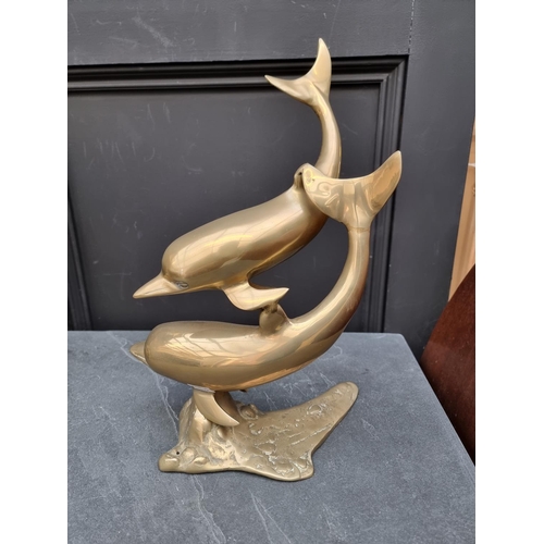 1246 - A brass figure group of two dolphins, 39cm high.