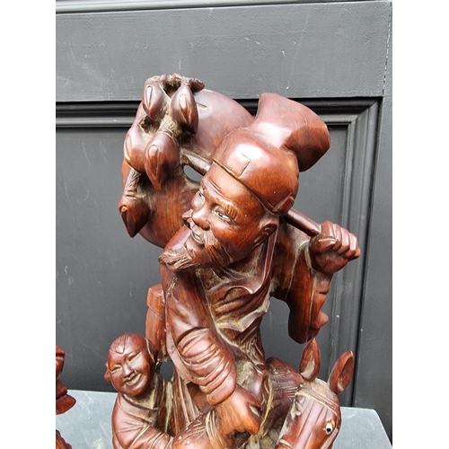 1247 - Two Japanese carved hardwood figure groups, largest 40cm.