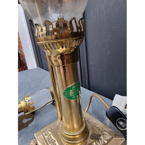 1249 - A brass table lamp, total height 48.5cm; together with a pair of GWR style brass wall lights. (3)... 