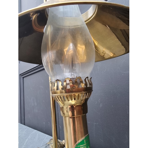 1249 - A brass table lamp, total height 48.5cm; together with a pair of GWR style brass wall lights. (3)... 