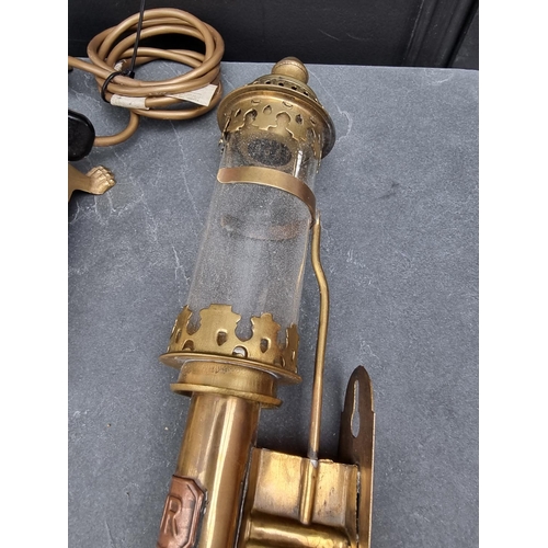 1249 - A brass table lamp, total height 48.5cm; together with a pair of GWR style brass wall lights. (3)... 