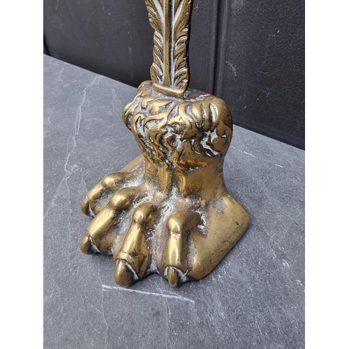 1253 - A 19th century brass 'hairy paw' doorstop, 37.5cm high.