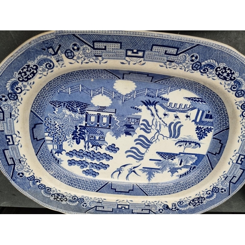 1258 - Two Victorian blue and white meat plates, largest 50.5cm wide; and two others. (4)... 