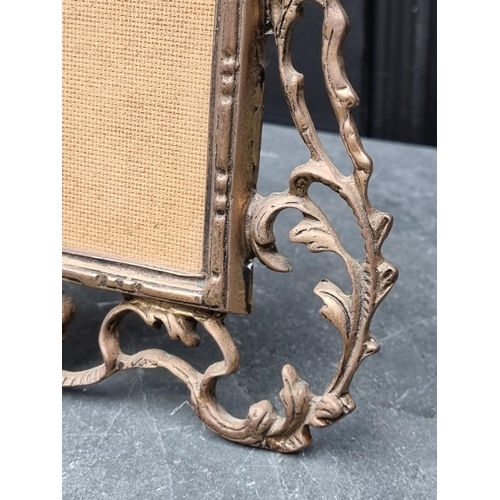 1268 - A cast brass easel back frame, 37cm high.