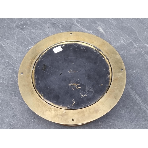 1272 - A Smiths Astral brass bulkhead clock, 27cm diameter.