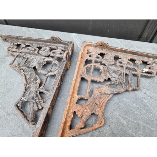 1283 - A set of six cast iron brackets. Please note: Shoe last withdrawn from lot.