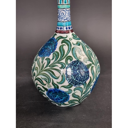 1287 - A William de Morgan pottery bottle vase, painted with Persian style flowers, 32cm high.... 