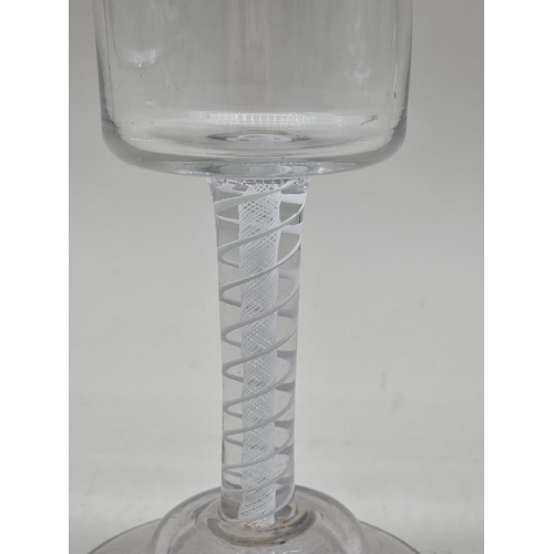 1293 - An 18th century double series opaque twist glass goblet, 20cm high.