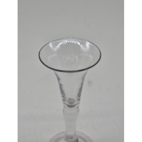 1300 - An 18th century gin glass, 12.5cm high. 