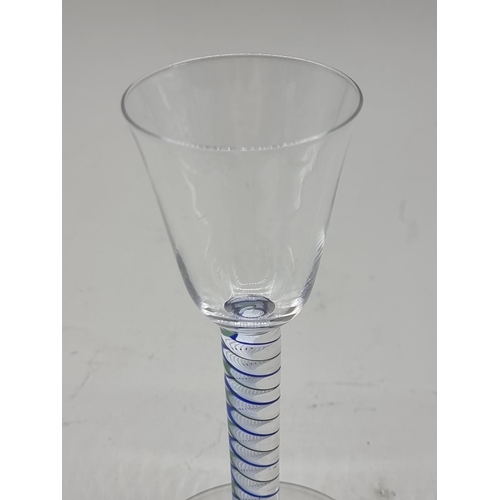 1304 - A 19th century colour twist wine glass, 15cm high.