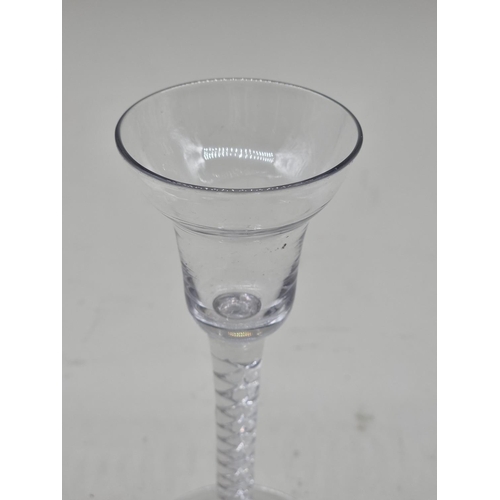 1305 - An 18th century mercury twist wine glass, with double ogee bowl, 15.5cm high.