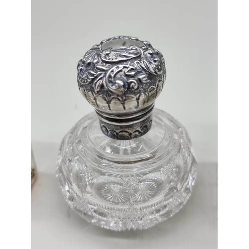 1318 - A small group of glass, to include a pair of silver mounted scent bottles, 7.5cm high. (7)... 