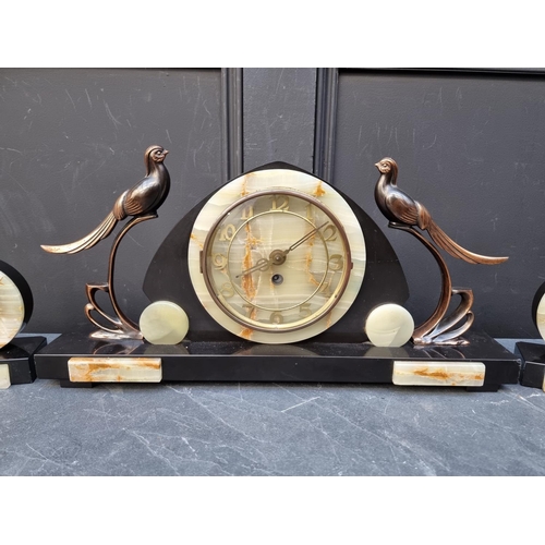 1322 - An Art Deco slate and green onyx clock garniture, the clock 52.5cm wide.  ... 