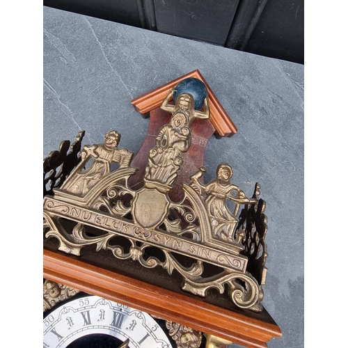 1380 - A Dutch mahogany and brass wall clock, with weights and pendulum.