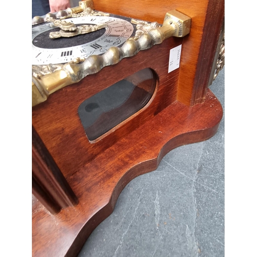 1380 - A Dutch mahogany and brass wall clock, with weights and pendulum.