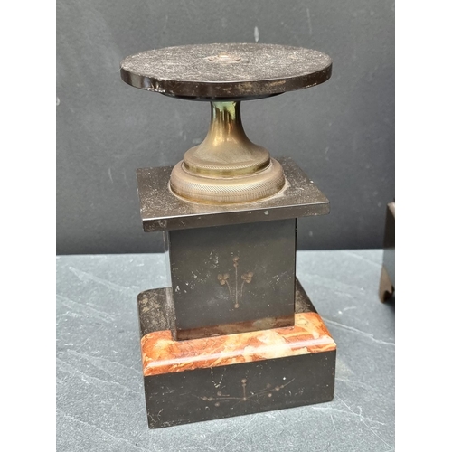 1409 - A late Victorian slate and brass mantel clock, 28.5cm high; together with a similar pair of side urn... 