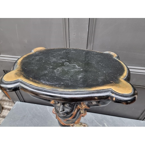 1455 - An antique painted spelter blackamoor stand or table, 69.5cm high.