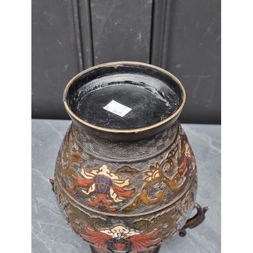 1457 - A Chinese bronze and champleve enamel twin handled vase, 24cm high.