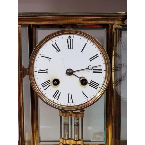 1458 - An antique brass four glass mantel clock, with mercury pendulum, 25cm high, (s.d. to dial). ... 