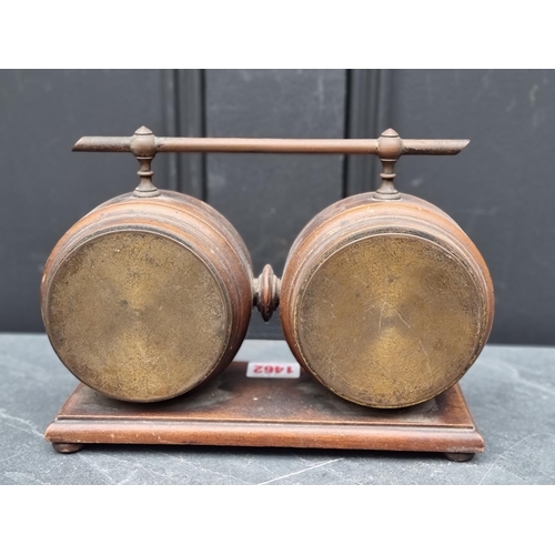 1462 - A late Victorian walnut combined clock and barometer set, with ivorine dials, 23.5cm wide.... 