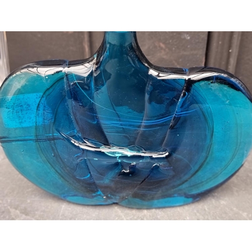 1465 - A Mdina blue glass vase, 14cm high; together with an Orrefors clear glass vase, 20cm high; and an ol... 