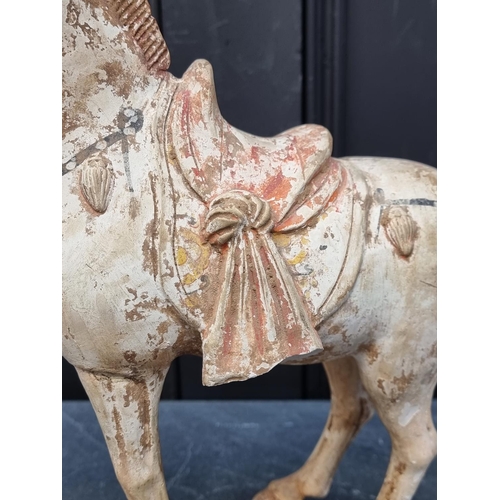 1468 - A Chinese Tang style pottery horse, 32cm high, (s.d.).