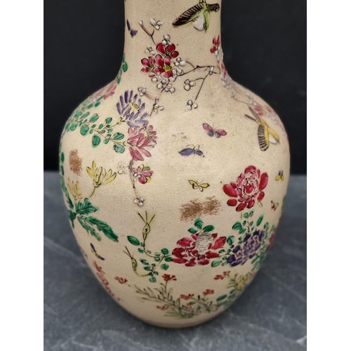 1473 - A pair of Japanese Satsuma pottery vases and covers, 26cm high. (2)