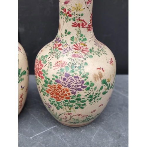 1473 - A pair of Japanese Satsuma pottery vases and covers, 26cm high. (2)