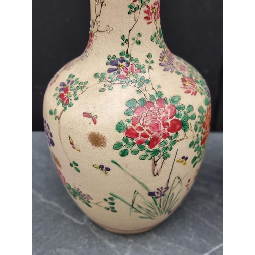 1473 - A pair of Japanese Satsuma pottery vases and covers, 26cm high. (2)