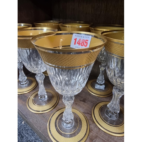 1485 - A suite of St Louis clear and gilt drinking glasses, largest 17cm high. (15)