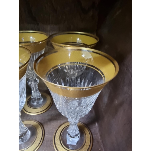 1485 - A suite of St Louis clear and gilt drinking glasses, largest 17cm high. (15)