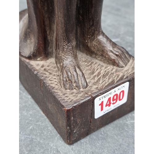 1490 - An old carved oak gargoyle, 37cm high.