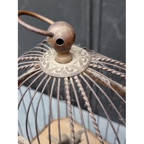 1491 - A vintage Swiss singing bird in cage automaton, 30cm high.