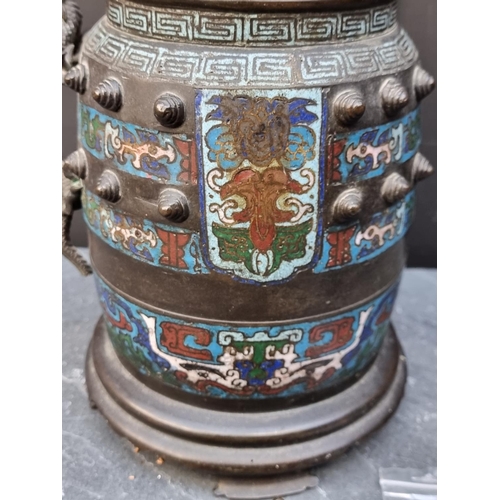 1493 - A Chinese bronze and champlevé enamel twin handled vessel and cover, 30cm high, (element... 