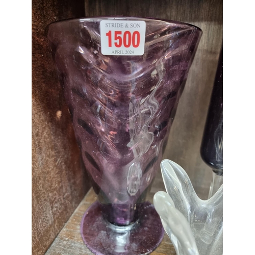 1500 - A mixed group of coloured glass, largest 31.5cm high. (17)