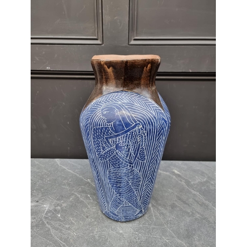 1519 - Studio Pottery: a large vase, by Martha Stevenson, decorated in sgraffito style with minstrels, sign... 