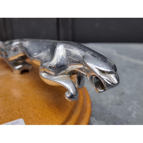 1520 - Automobilia: an unusual display of four vintage chrome car mascots, to include three Jaguar examples... 