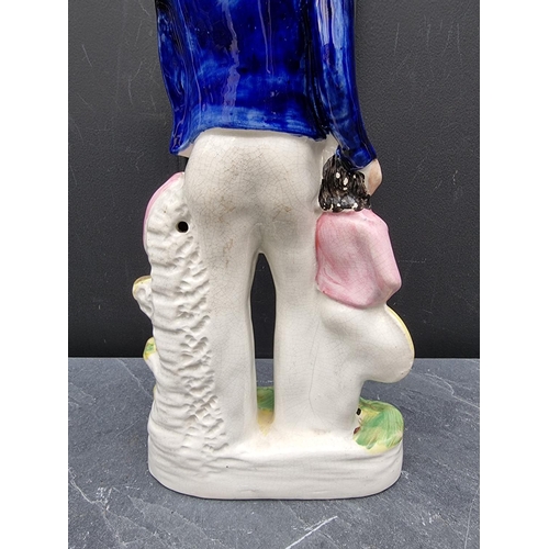 1535 - A large Victorian Staffordshire pottery figure of 'Begging Sailor', 43cm high.