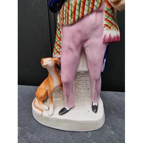 1536 - A large Victorian Staffordshire pottery figure of 'Walter Scott', 36.5cm high.