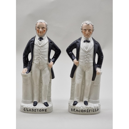 1540 - A rare pair of Victorian Staffordshire pottery figures of 'Gladstone' and 'Beaconsfield', 30.5cm hig... 