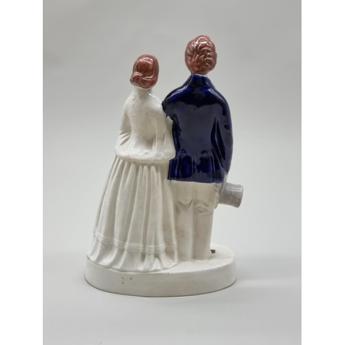 1547 - A Victorian Staffordshire pottery figure group of 'Prince & Princess', 26cm high.... 