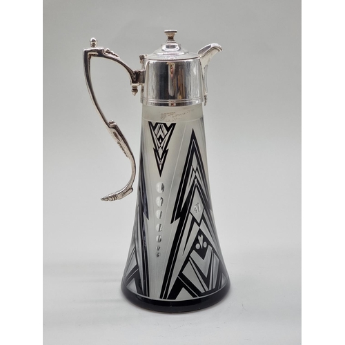 1553 - An Art Deco style electroplate mounted etched glass claret jug, 28.5cm high; together with a similar... 