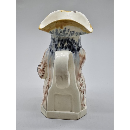 1558 - A late 18th century Creamware toby jug, 25cm high, (s.d.).