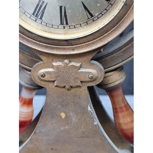 1562 - A Victorian gilt brass and agate novelty ships wheel timepiece, inscribed 'Phillipson & Golder, ... 