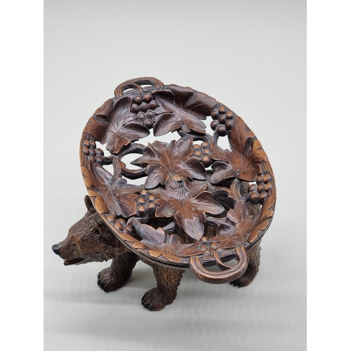 1564 - A Black Forest carved wood bear comport, 28cm wide, (probably associated).